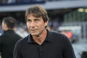 Conte sorride